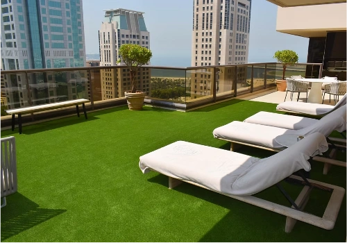 Apartment balcony artificial grass setup
