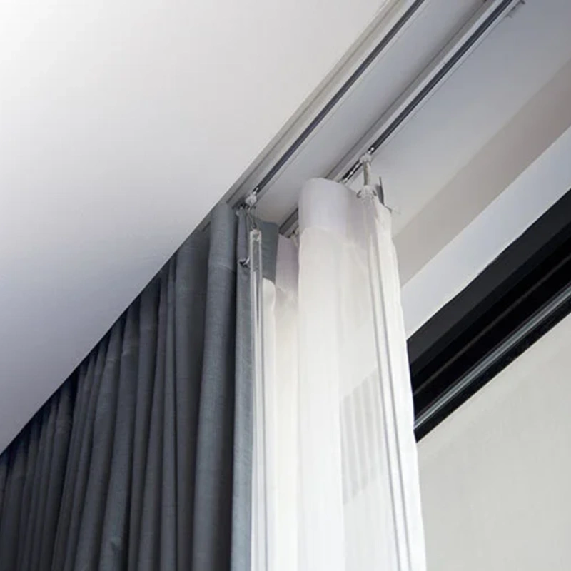 Durable blackout curtain tracks