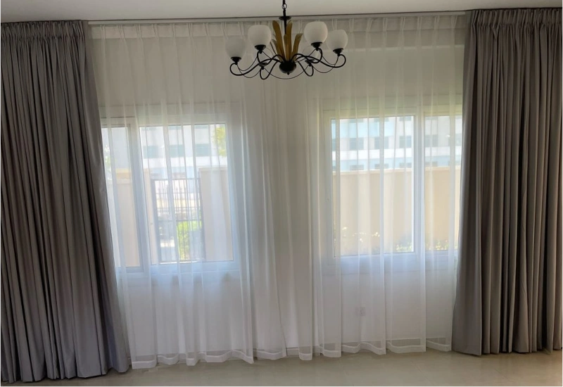Custom hotel room curtain styling