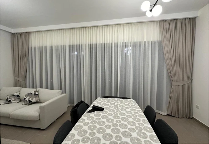 elegant curtain installation in Dubai