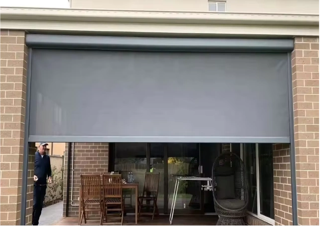 Manual roll outdoor blinds