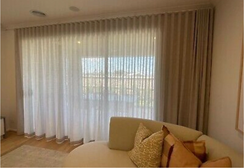 Sheer curtains installed in hotel room