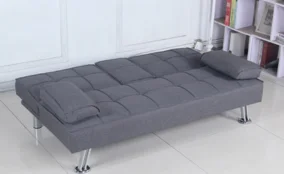 Grey futon sofa bed in Dubai with cushions and metal legs