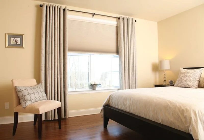 Modern bedroom with elegant curtains in Dubai