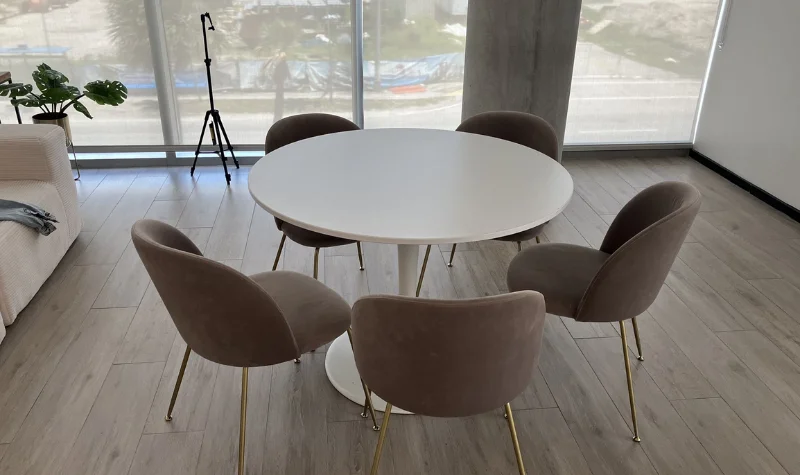 Upholstered dining chairs with golden legs Dubai