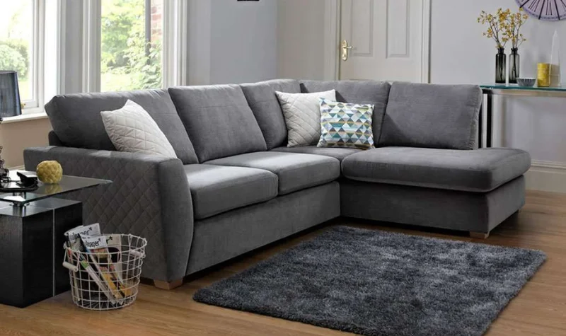 Stylish grey fabric corner sofa with cushions in Dubai