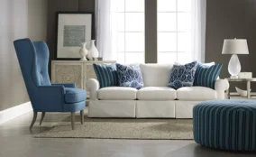 White sofa with blue chair