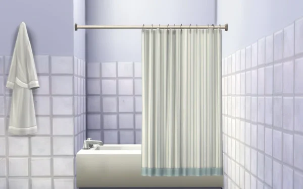 White shower curtain with light blue border in a tiled Dubai bathroom