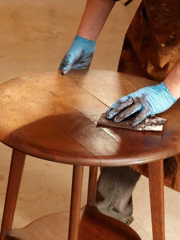 Polishing wooden dining table in Dubai for smooth shine