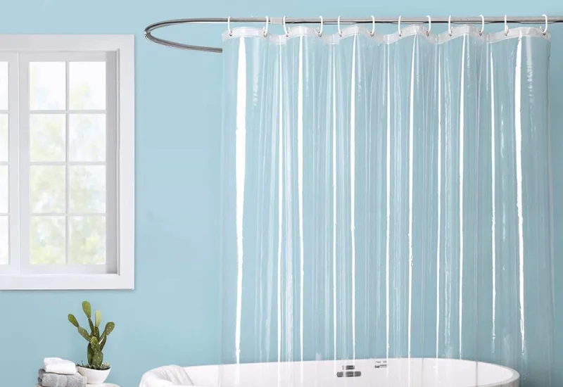 Clear transparent shower curtain with bathtub in Dubai bathroom