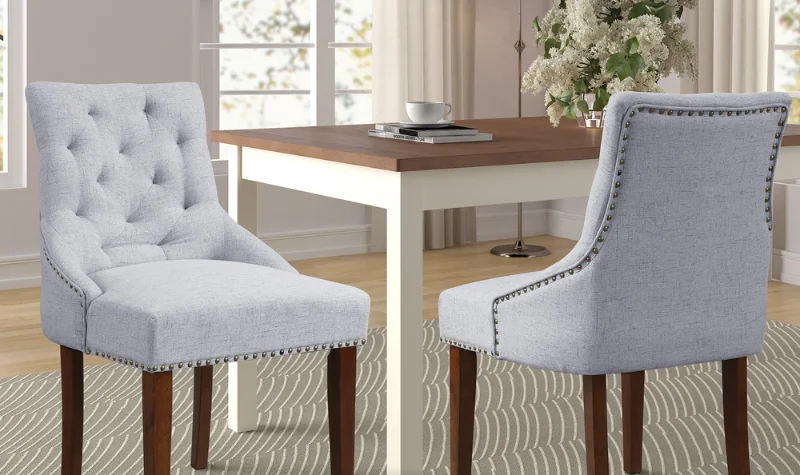 Grey upholstered dining chairs with wooden legs Dubai