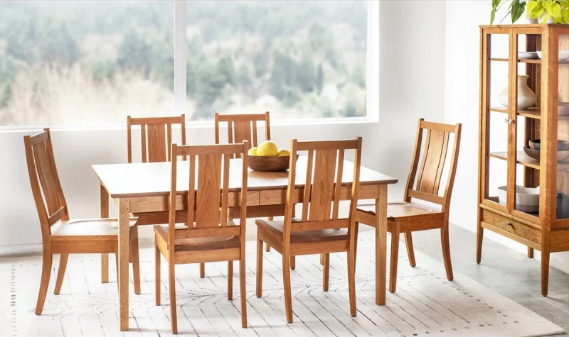 Classic wooden dining table with six chairs