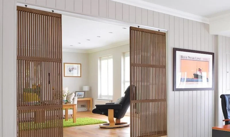 Wooden slatted room partition in modern Dubai home interior