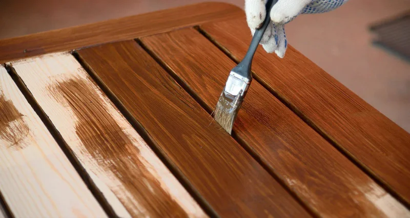 Varnish polish on wooden furniture in Dubai for glossy finish