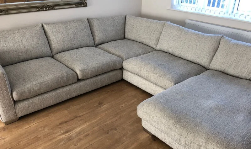 Grey sectional sofa after cleaning