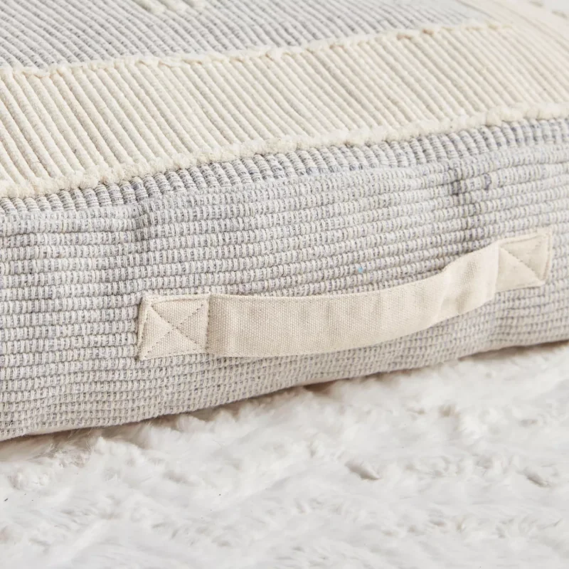 Estonished textured floor cushion handle