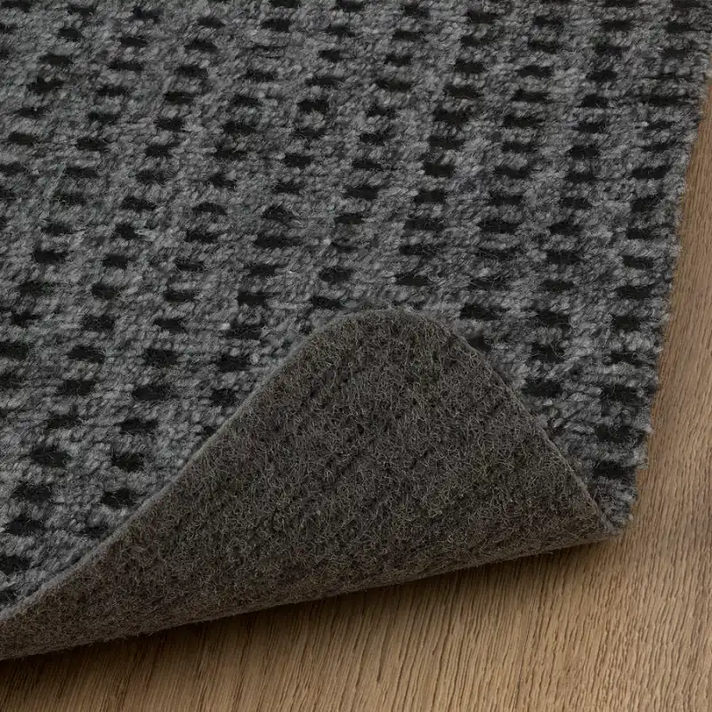 doormat on wooden floor entrance